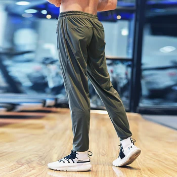  Тонкие спортивные штаны для тренировок Slim Fit Быстросохнущие удобные удобные джоггеры Мужчины Бег Длинные брюки Тренажерный зал Спортивные брюки для фитнеса Карман на молнии