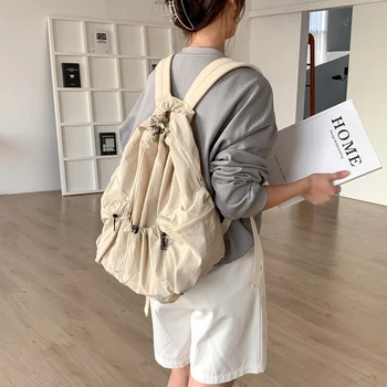  2023 Новая нейлоновая женская сумка Молодежный рюкзак на шнурке Сумка Средний рюкзак Корейский стиль преппи Женская сумка через плечо оптом
